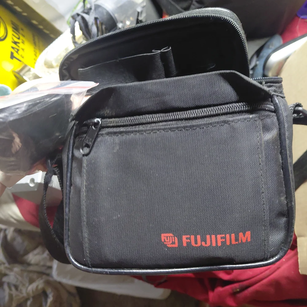 Fuji Discovery 1000 Zoom Date 35mm film camera. With Bag, Film, Film CleaninTool